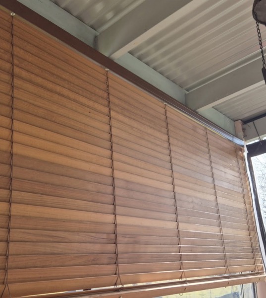 Timber batten screening under a Colorbond patio roof